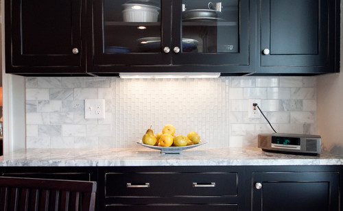 White Fantasy Granite Countertop with White Carrara Subway Tiles and Vertical White Ceramic Mini Subway Tiles, Ebony Finished Maple Kitchen Cabinets